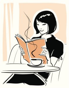 Women Reading Book at Cafe